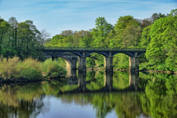 istock A Victorian style bridge over the River Lune near lancaster. 1202913455