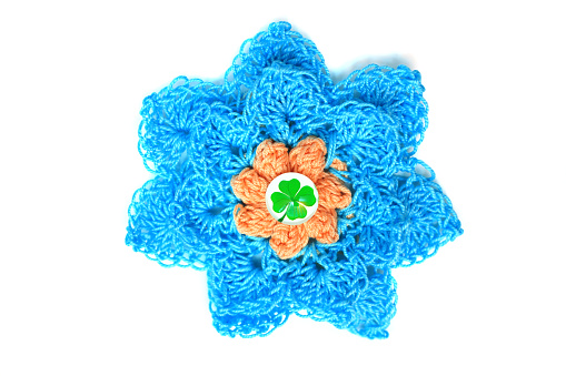 Crochet flower isolated on white / 1.5mm crochet hook was used and a clover babochon