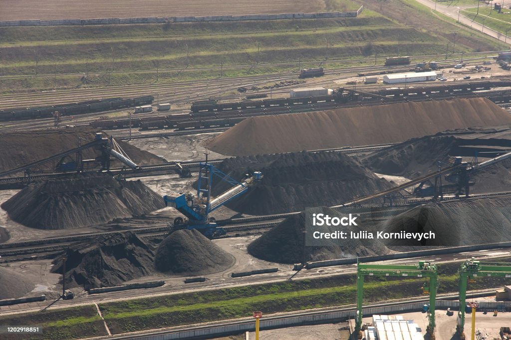 Coal Loading Rack Unloading Coal From An Open Storage Warehouse Using A Reclaimer And ...