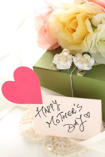 istock Artificial flower and gift box with ribbon 1202920433