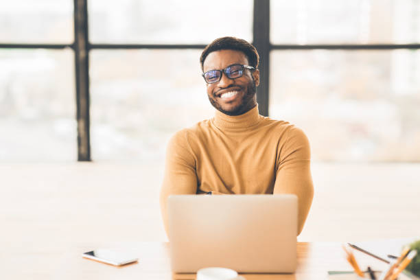 istock Portrait of happy black man looking at camera 1202920484