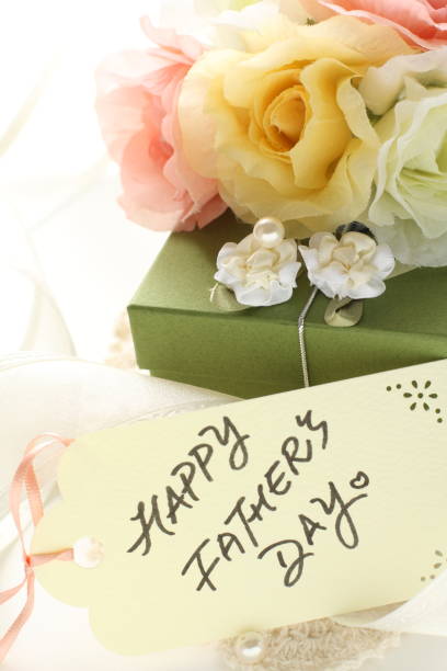 istock Artificial flower and gift box with ribbon 1202920524