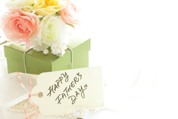 istock Artificial flower and gift box with ribbon 1202920533