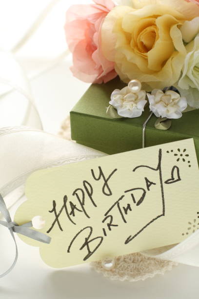 istock Artificial flower and gift box with ribbon 1202920568