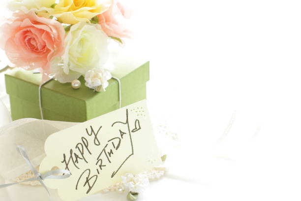 istock Artificial flower and gift box with ribbon 1202920577