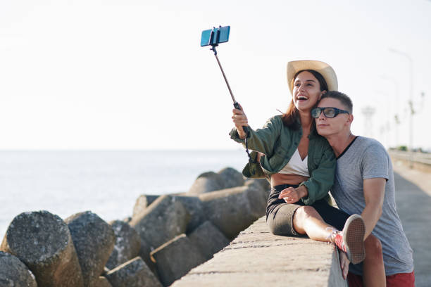 istock Happy Couple Taking Selfie 1202921829