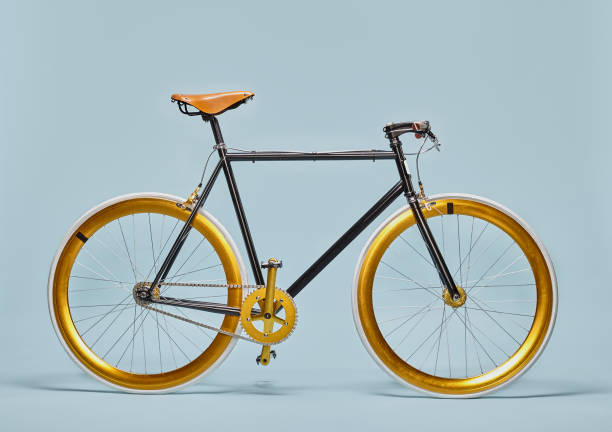 Trendy black and gold bicycle - fotografia de stock
