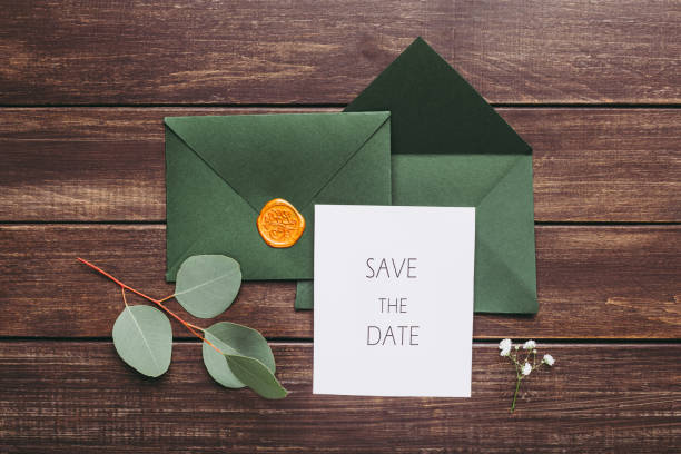 istock Marriage or Wedding Green envelopes with postcard inside 1202925359
