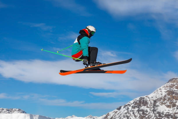 istock Male skier jumps in air 1202925456
