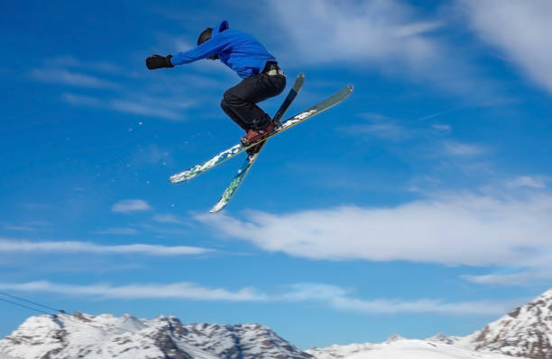 istock Skier jumps in snow park, big air 1202925462
