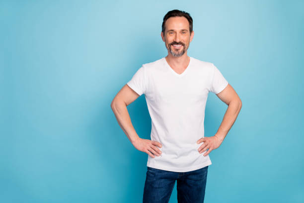 istock Portrait of his he nice attractive cheerful cheery content guy freelancer programmer IT department isolated on bright vivid shine vibrant teal green blue turquoise color background 1202927811