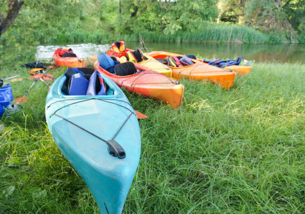 istock active kayaking, kayaks on the river Bank 1202928154