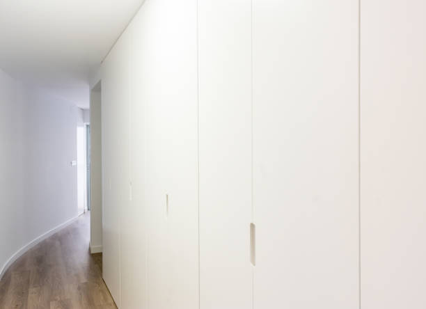 istock white decorated hallway to office entrance 1202930944