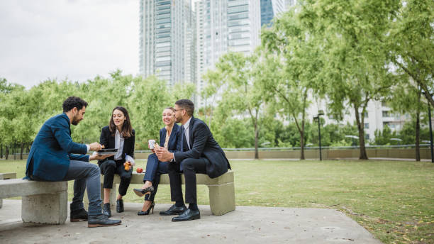 Colleagues on a lunch break in the park