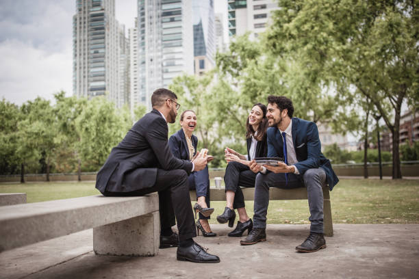 istock Colleagues on a lunch break in the park 1202933184
