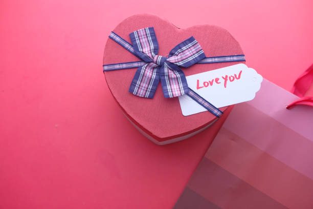 istock hear shape gift box with love you text 1202934851