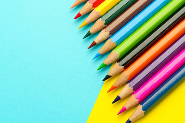Colored pencils on color background Colored pencils on color background colored pencil stock pictures, royalty-free photos & images