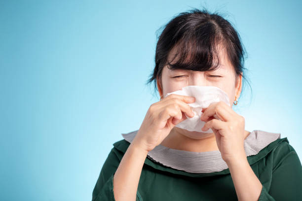 istock woman got nose allergy and flu 1202937881