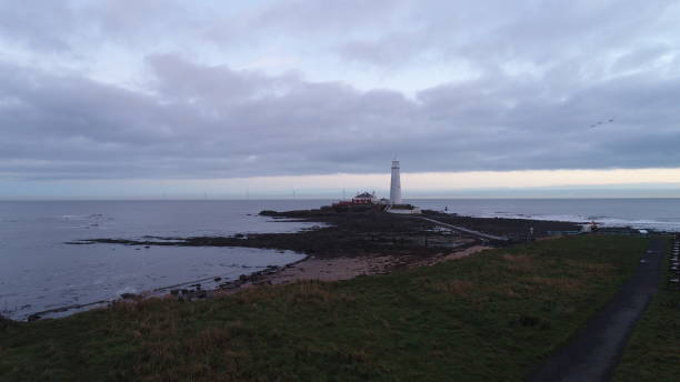 istock Sunrise over St Mary`s Lighthouse, Whitley Bay 1202941415