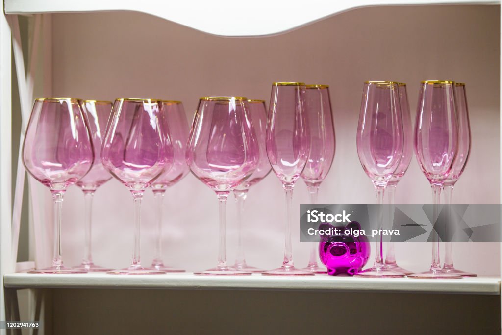 A Set Of Pink Glasses With A Gold Rim Beautiful Wine Glasses Of Modern  Design To Decorate A Wedding Feast And Holidays Stock Photo - Download  Image Now - iStock