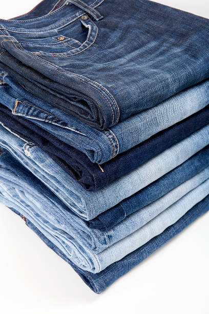 istock Fashionable clothes.  Jeans on a  background. 1202944197