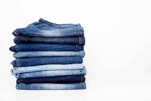 istock Fashionable clothes.  Jeans on a  background. 1202944569