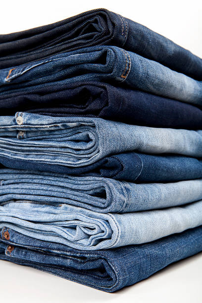 istock Fashionable clothes.  Jeans on a  background. 1202946574