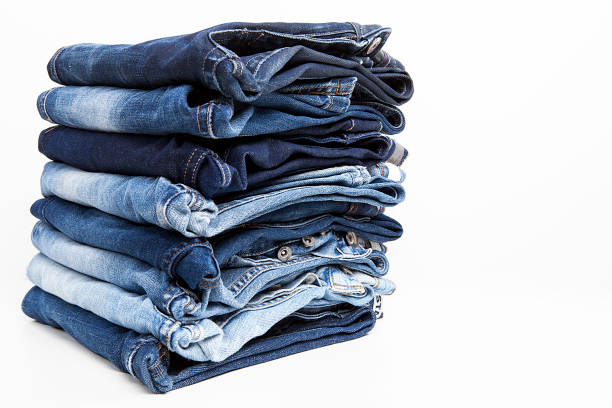 istock Fashionable clothes.  Jeans on a  background. 1202947322