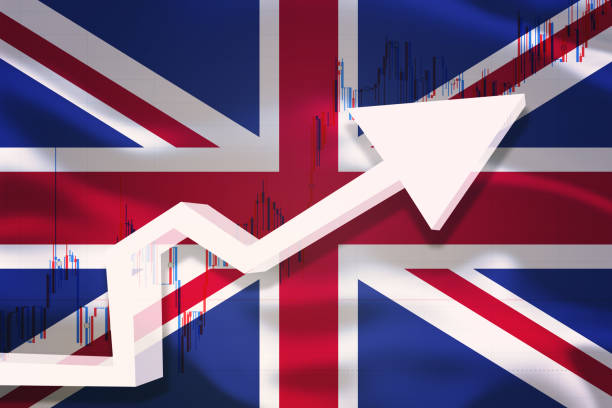 istock United Kingdom growth chart. White 3D arrow and stocks chart grows up on the background of waving flag of the country. 1202949176