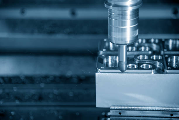 istock The CNC milling machine chamfer cut the injection mold parts by chamfer tools. 1202950031