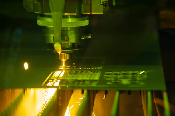 istock The fiber laser cutting machine cutting the sheet metal  plate for computer case. 1202950089