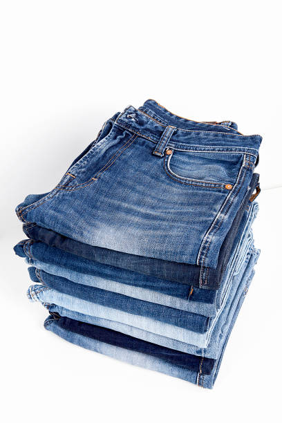 istock Fashionable clothes.  Jeans on a  background. 1202951410