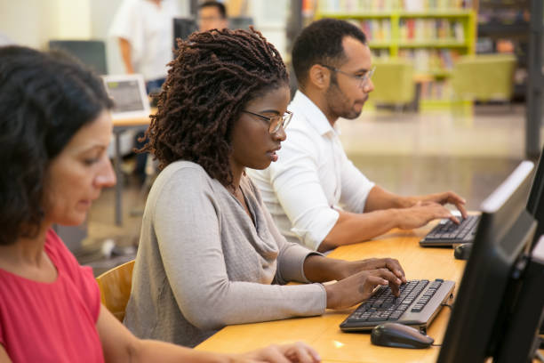 istock Focused African American woman typing on computer keyboard 1202953042