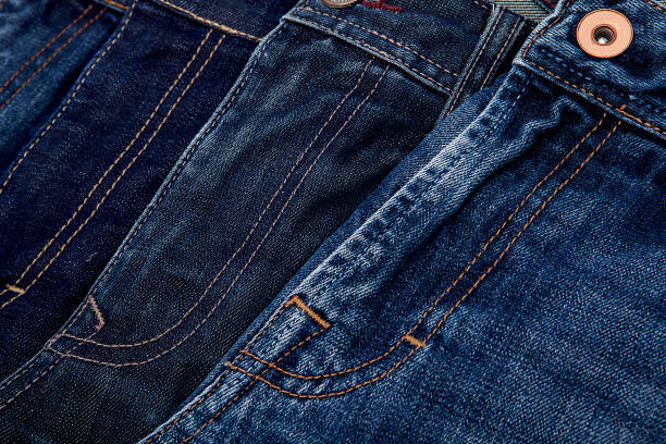istock Fashionable clothes.  Jeans on a  background. 1202953749