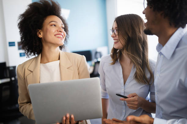 istock Successful business group of people at work in office 1202955066