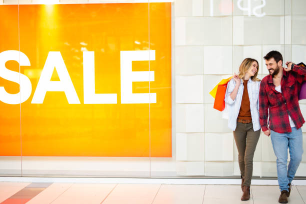 Young couple in shopping center