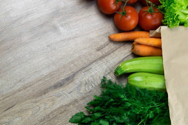 istock Many different vegetables including beets, cabbage, zucchini, carrots, tomatoes, peppers and cucumbers 1202956646