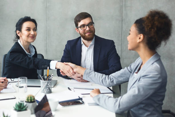 istock Successful partnership. Businesspeople handshaking after reached agreement 1202956909