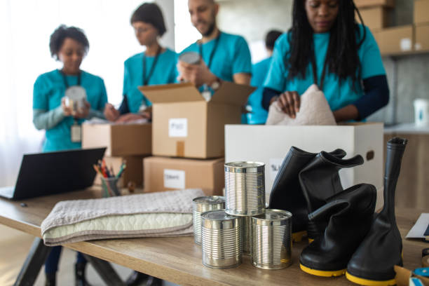 istock Volunteers packing humanitarian aid 1202957508