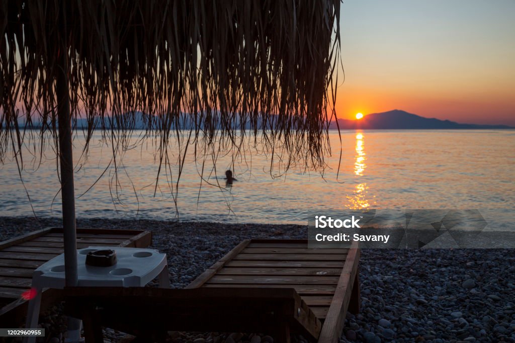 Sunset Sunset  on beach on Greek Island Euboea Euboea Stock Photo