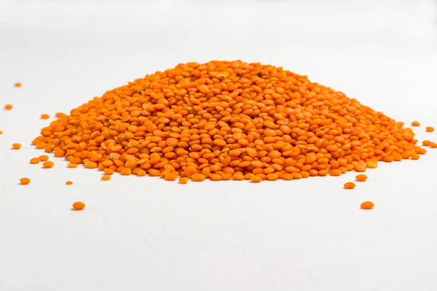 Red lentils source of vegetable protein and omega-3. Health food fitness.  White background