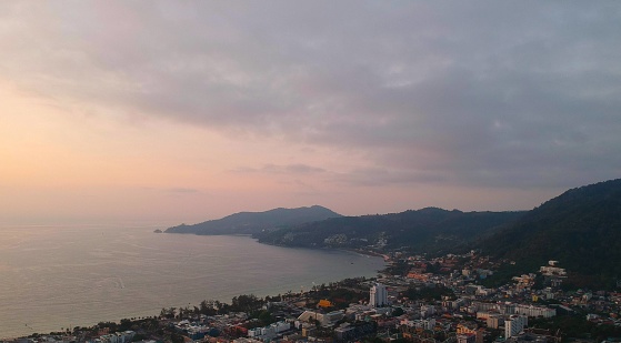 Panoramic Aerial Drone View of Patong Phuket Thailand with lovely sunset colours