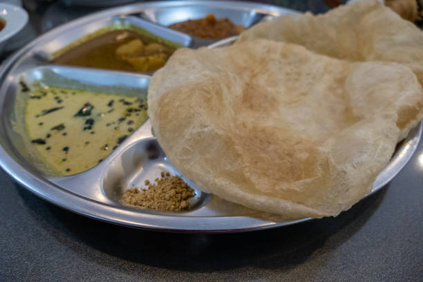 istock Burmese naan flatbread served with dipping sauces 1202962747