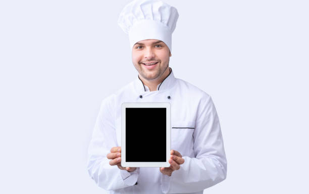 Chef Guy Showing Tablet Screen Standing Over White Background, Mockup
