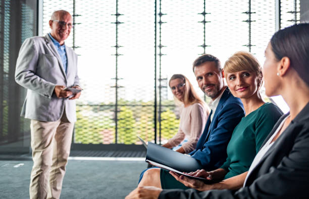 istock Businessman coach in the auditorium 1202964459