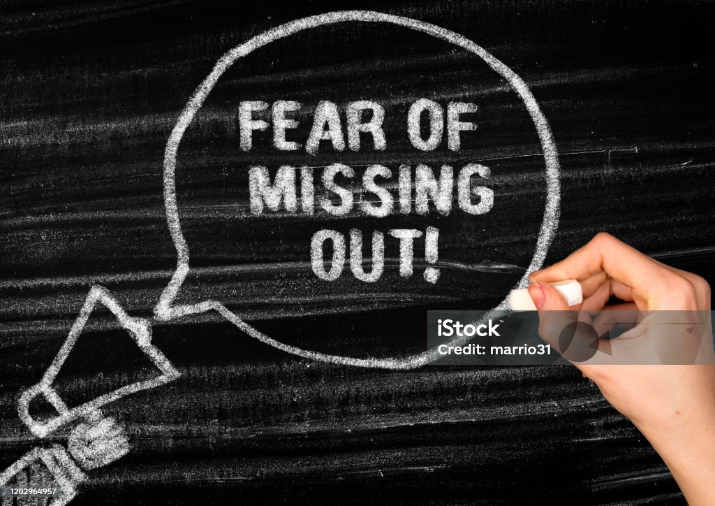 FOMO - Fear Of Missing Out FOMO Stock Photo