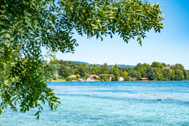 The Alps near Lake Geneva, Switzerland.  This is viewed from the shore near Nyon looking  across a Bay on Lake Geneva.
