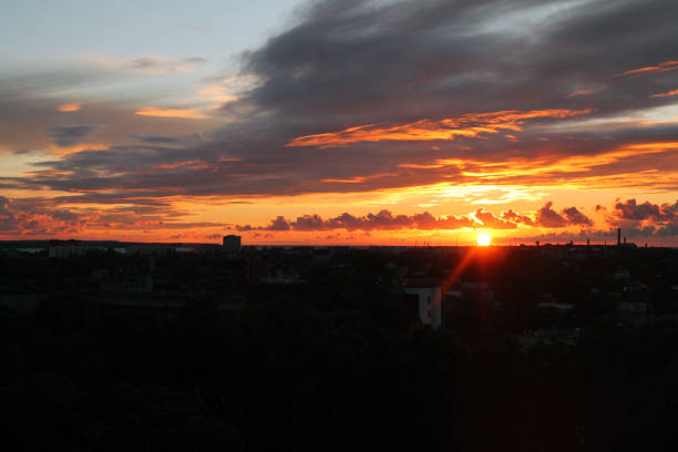 istock Sunset behind the buildings in the Baltic sky 1202970810