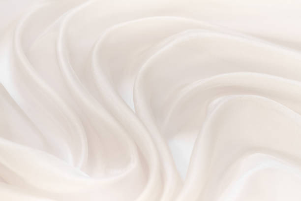 istock Wavy beige organza close-up 1202972735