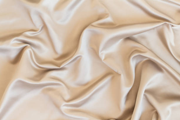 istock Wavy beige organza close-up 1202972741
